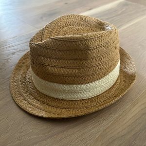 Tan straw fedora.